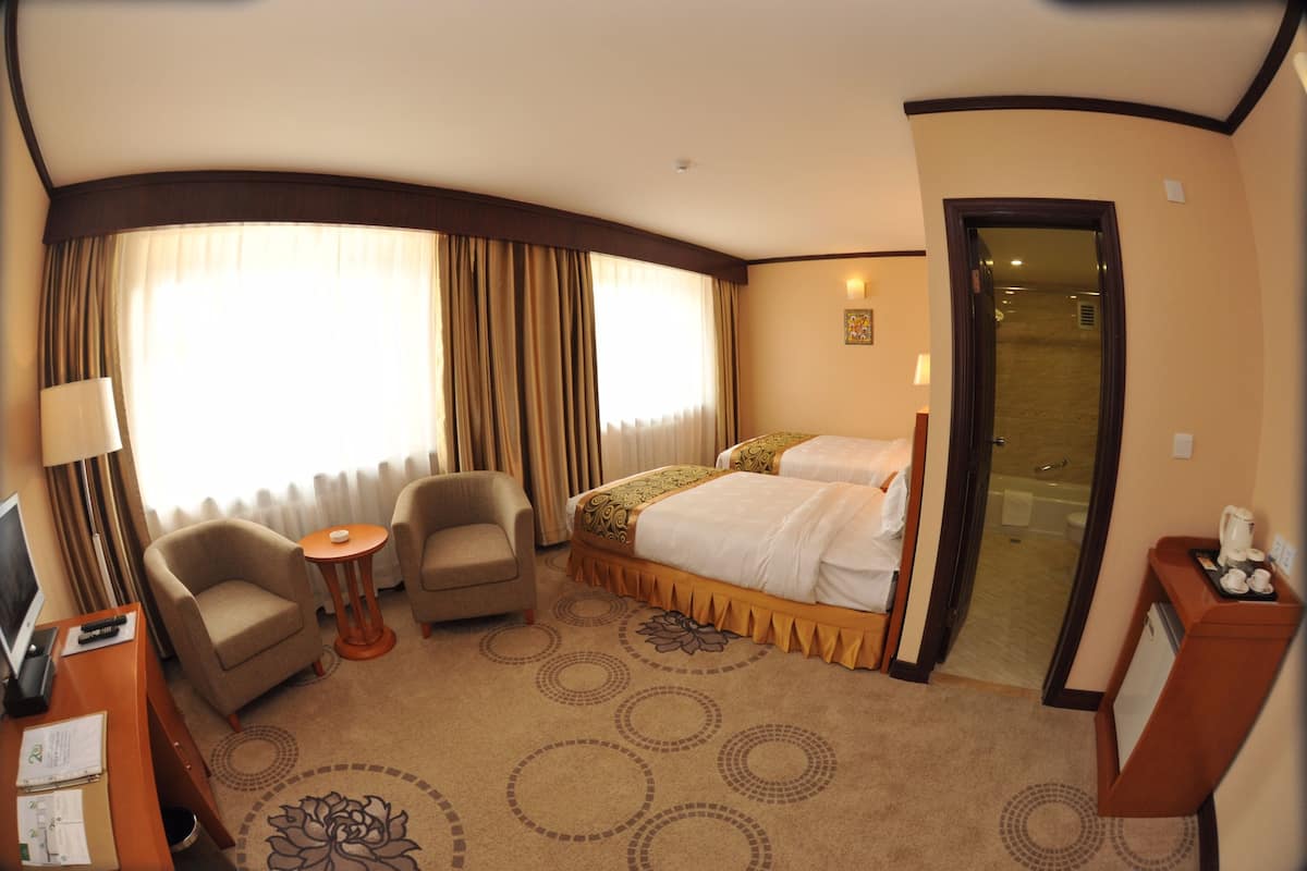 standard room, city view | 1 bedroom, premium bedding, minibar, in-room safe