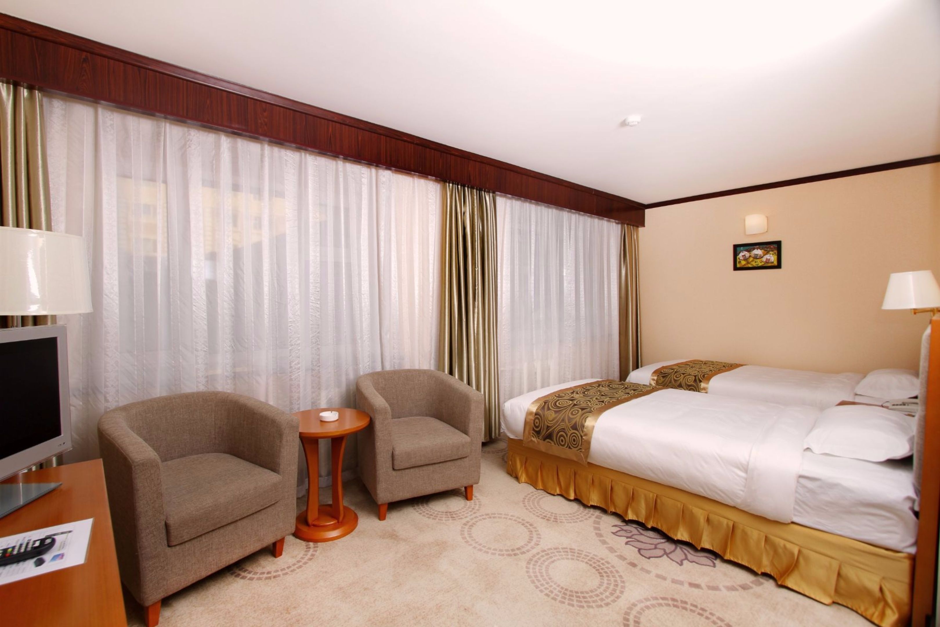 standard room, city view | 1 bedroom, premium bedding, minibar, in-room safe