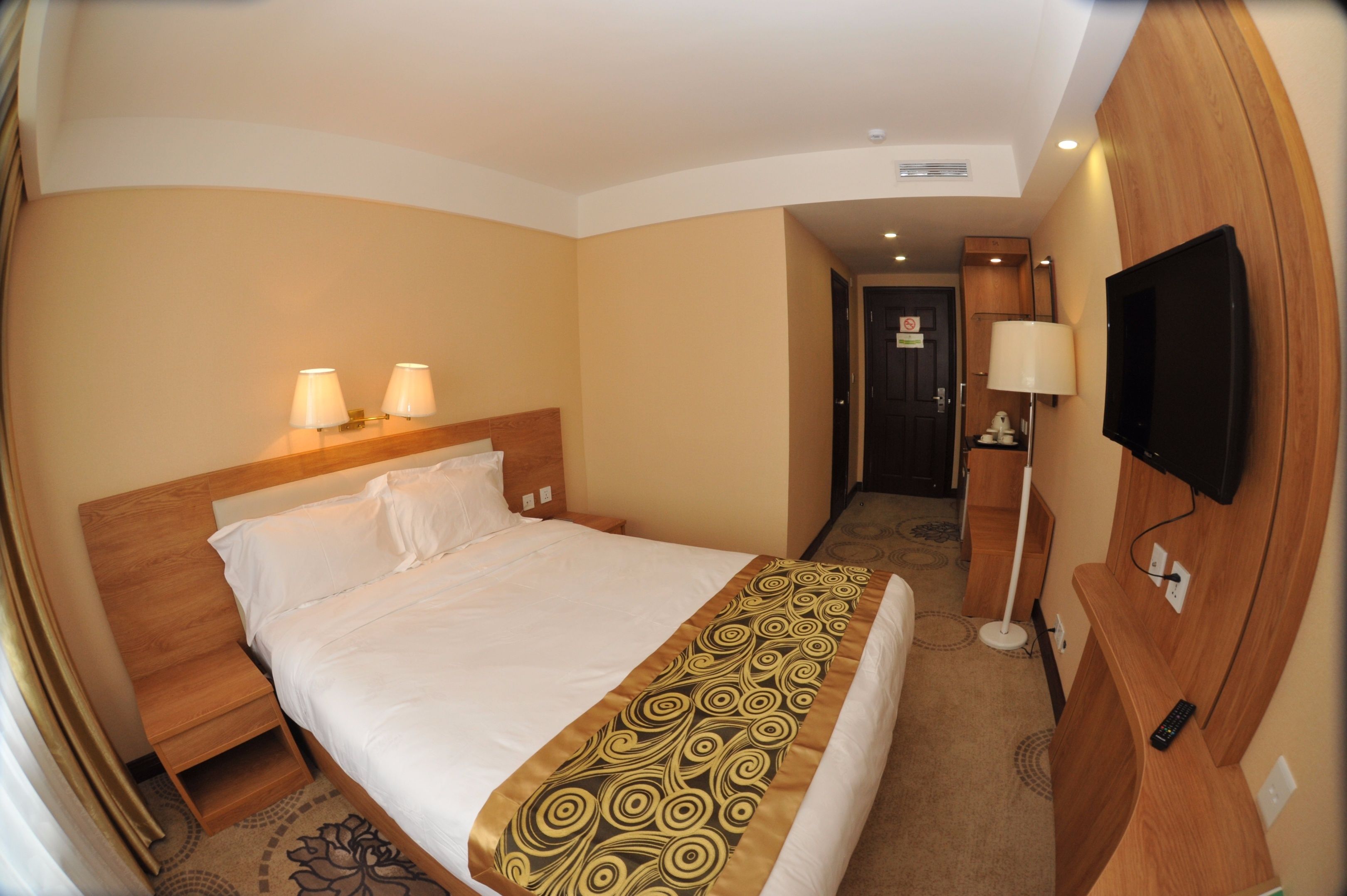 economy double room, city view | 1 bedroom, premium bedding, minibar, in-room safe