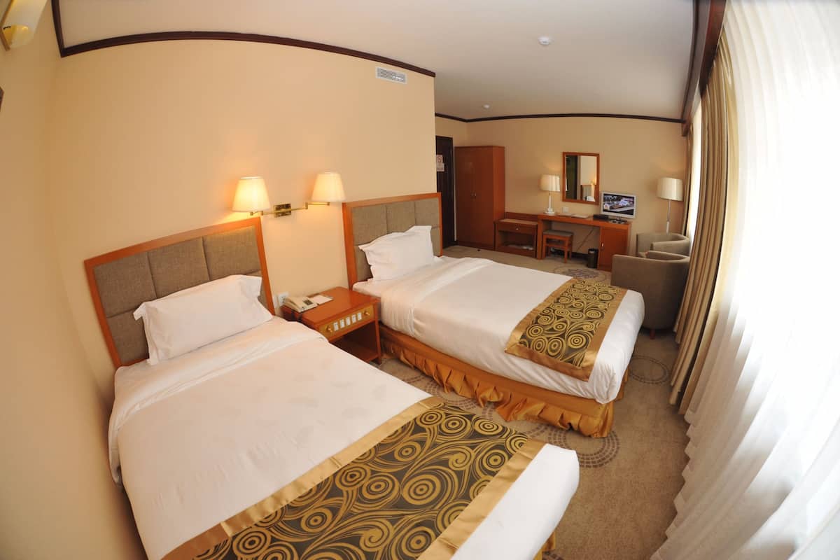 standard room, city view | 1 bedroom, premium bedding, minibar, in-room safe