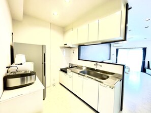 エグゼクティブ アパートメント 禁煙 | 1 室のベッドルーム、デスク、ノートパソコン用作業スペース、遮光カーテン