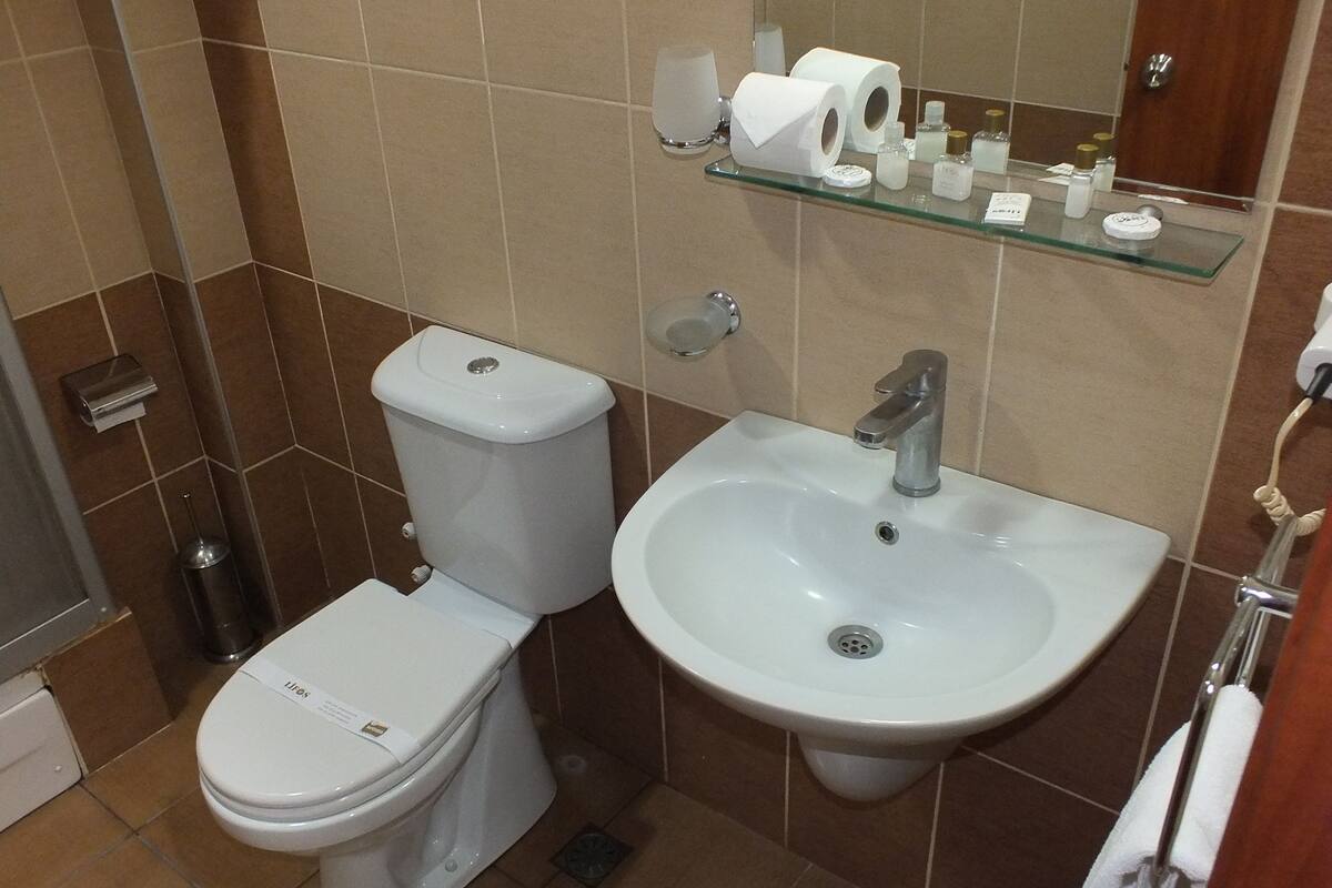 shower, free toiletries, hair dryer, bathrobes