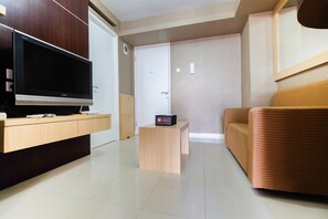 Apartment, 2 Bedrooms | Living room | Flat-screen TV - Homely 2 Bedroom at Bassura City Apartment By Travelio (Jakarta)
