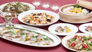 A variety of dishes including seafood, vegetables, and dumplings on a table. - Koriyama View Hotel (Koriyama)