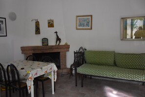 Family Apartment, 1 Bedroom | Living area | TV