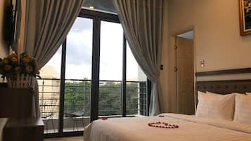 Suite Double or Twin Room, Balcony, River view | 1 bedroom, down comforters, pillowtop beds, minibar