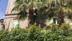 A stone building with a sign for 'Hotel Konak'. - Cunda Has Konak Otel (Ayvalik)