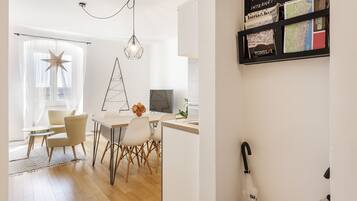 Deluxe Apartment | Living area | Flat-screen TV
