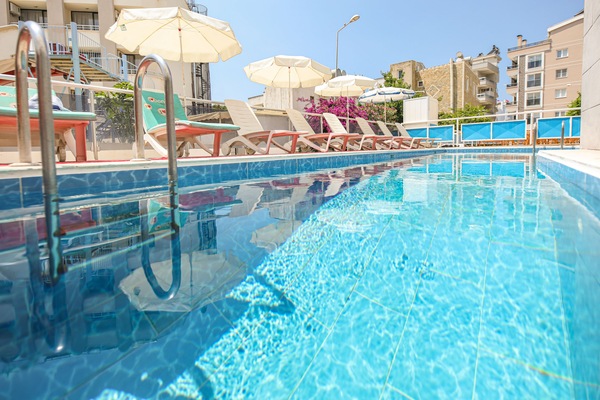 Seasonal outdoor pool, open 10 AM to 7 PM, pool umbrellas, sun loungers