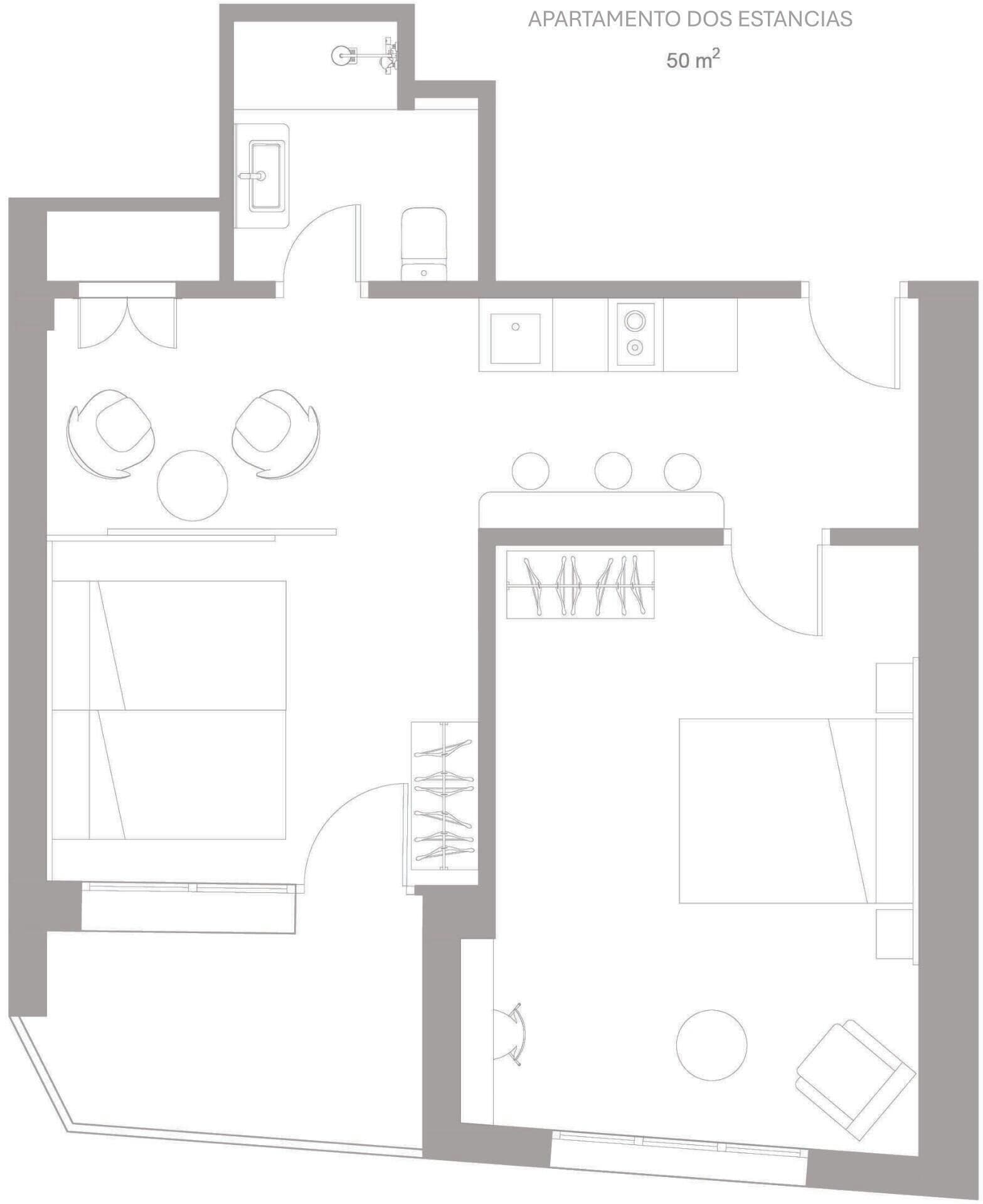 Distribución de un apartamento de 50 m² con cocina, comedor, dos dormitorios y un baño.