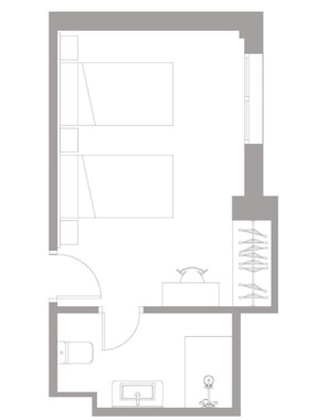 A floor plan with a bathroom, kitchenette, and a seating area. - Hotel Mogay (Chantada)