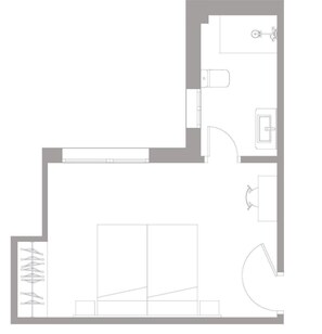 A floor plan with a bathroom, kitchen, and a large open space, possibly a living area or bedroom. - Hotel Mogay (Chantada)