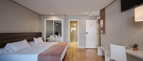 Triple Room | 1 bedroom, down comforters, desk, free WiFi