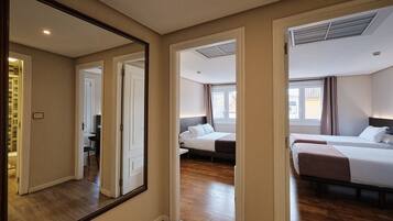 Family Quadruple Room | 1 bedroom, down comforters, desk, free WiFi