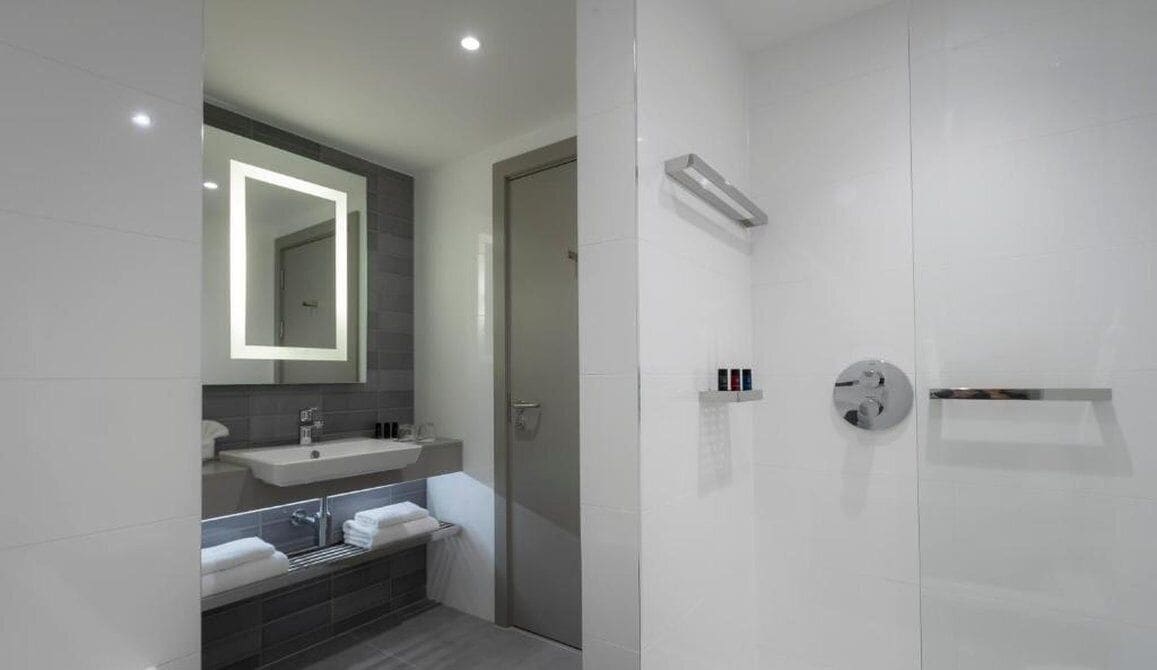 shower, eco-friendly toiletries, hair dryer, towels