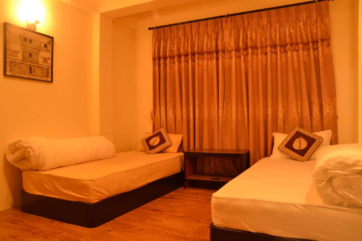 Phòng 2 giường đơn Deluxe, 2 giường đơn, phù hợp cho người khuyết tật, quang cảnh vườn | Bàn, truy cập Internet không dây miễn phí, bộ trải giường 
