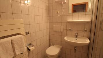 Shower, free toiletries, hair dryer, towels