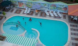 Outdoor pool, open 10 AM to 10 PM, pool loungers
