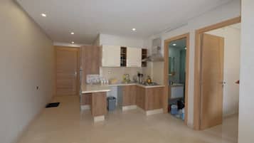 Basic Room, 1 Bedroom | Private kitchen | Full-sized fridge, microwave, stovetop, coffee/tea maker