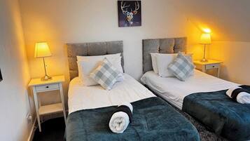 4 slaapkamers, een strijkplank/strijkijzer, wifi, beddengoed