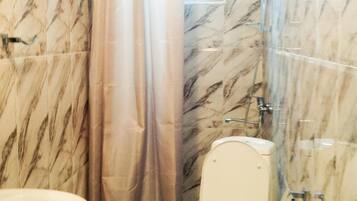 Shower, free toiletries, hair dryer, slippers