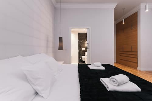 Premier Apartment, 2 Bedrooms, Pool Access | 1 bedroom, desk, laptop workspace, iron/ironing board