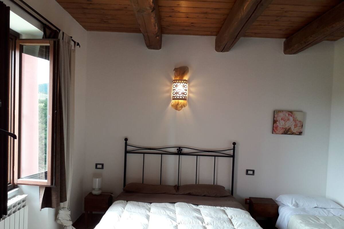 Triple Room, Hill View | Desk, WiFi (free), bed sheets