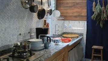 2-Bedroom Townhome | Private kitchen | Full-size fridge, microwave, stovetop, coffee/tea maker