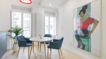 Apartment, 1 Bedroom | Living room | Flat-screen TV