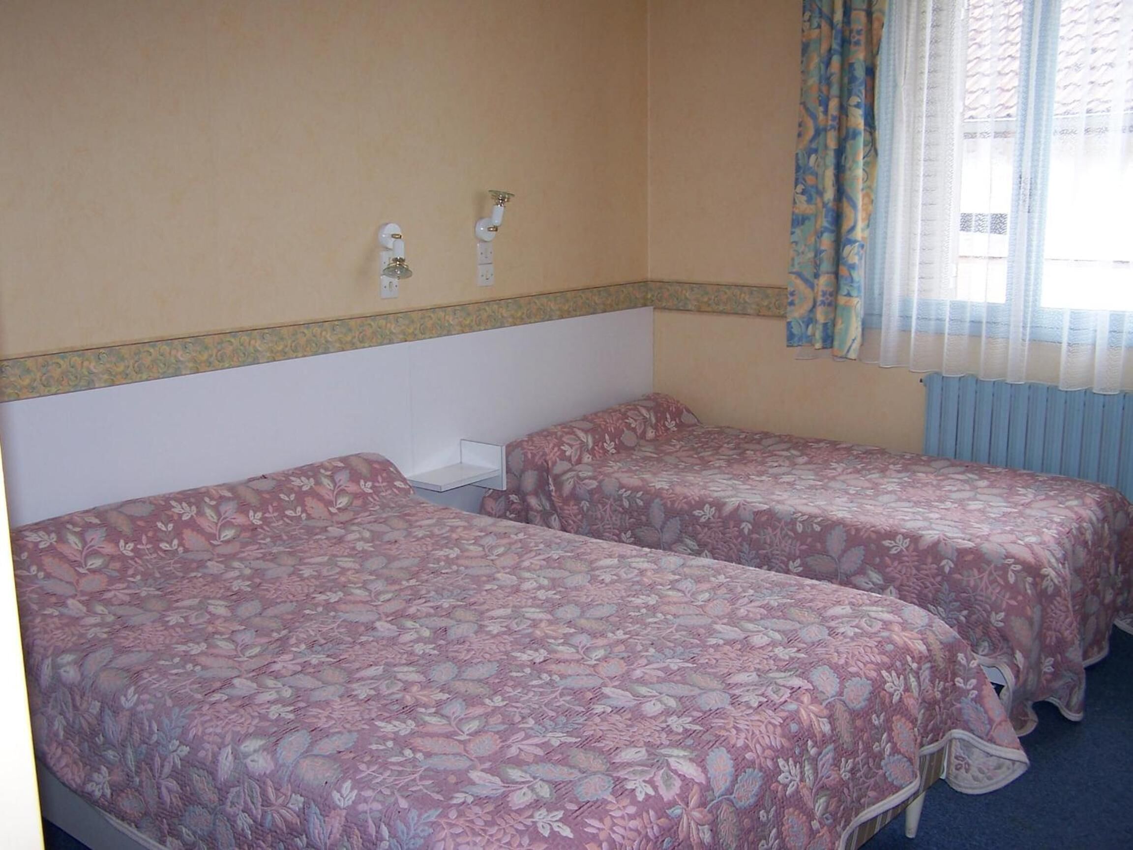 individually decorated, individually furnished, desk, blackout curtains