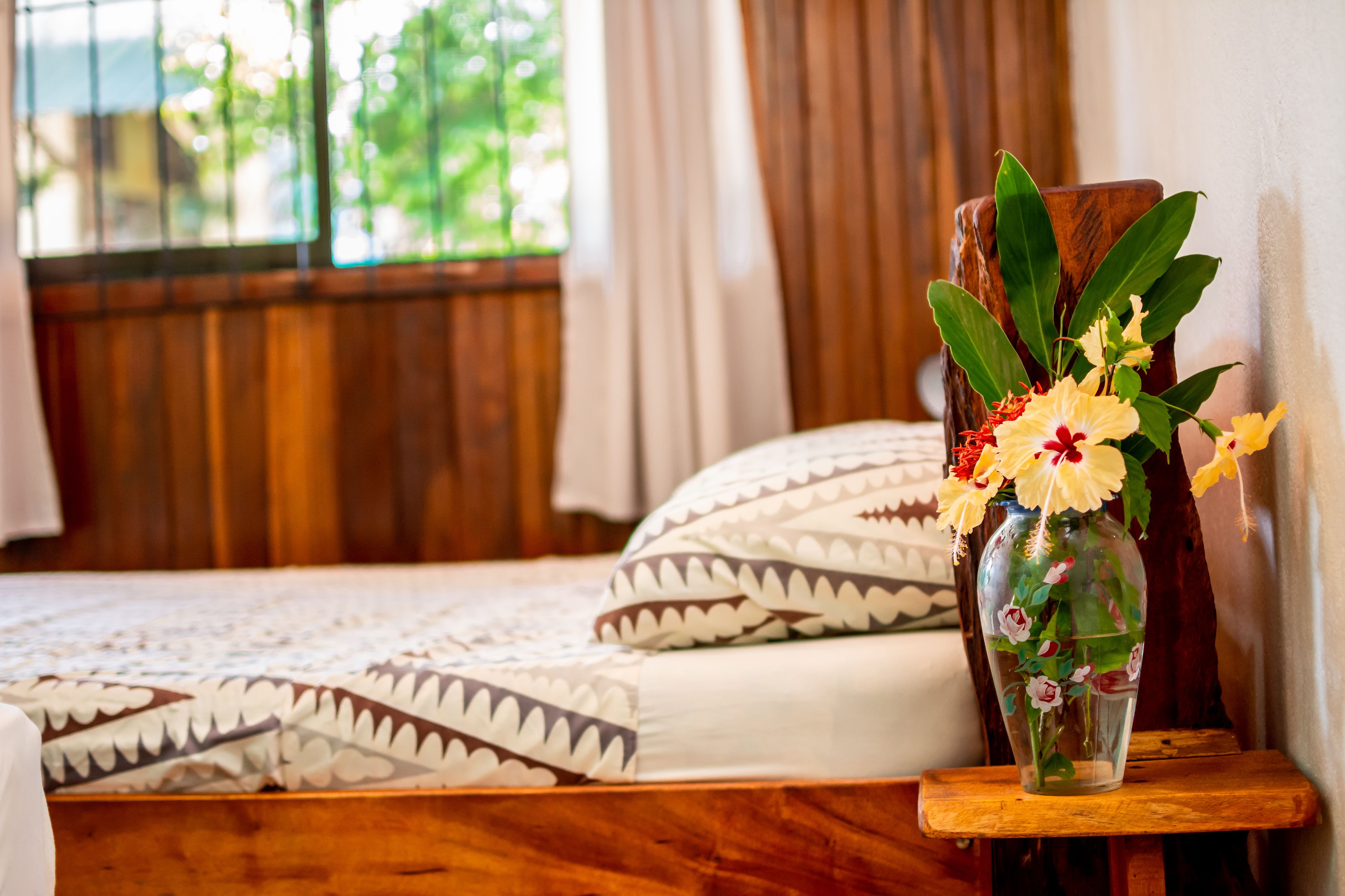 economy triple room, multiple beds, non smoking, pool access | bed sheets