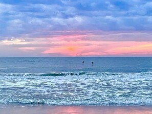 On the beach, sun-loungers