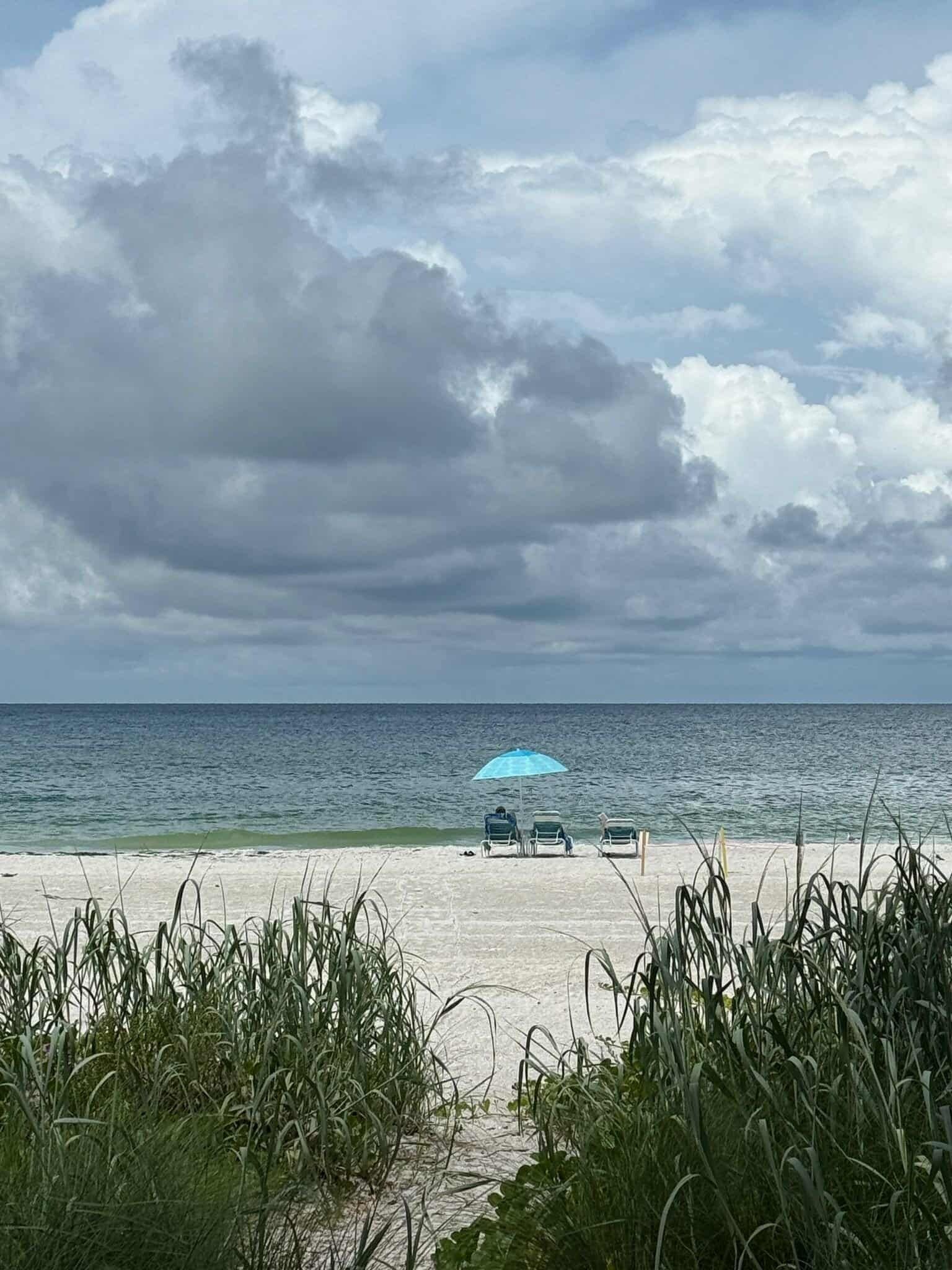 On the beach, sun loungers, beach towels