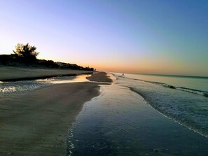 On the beach, sun-loungers, beach towels