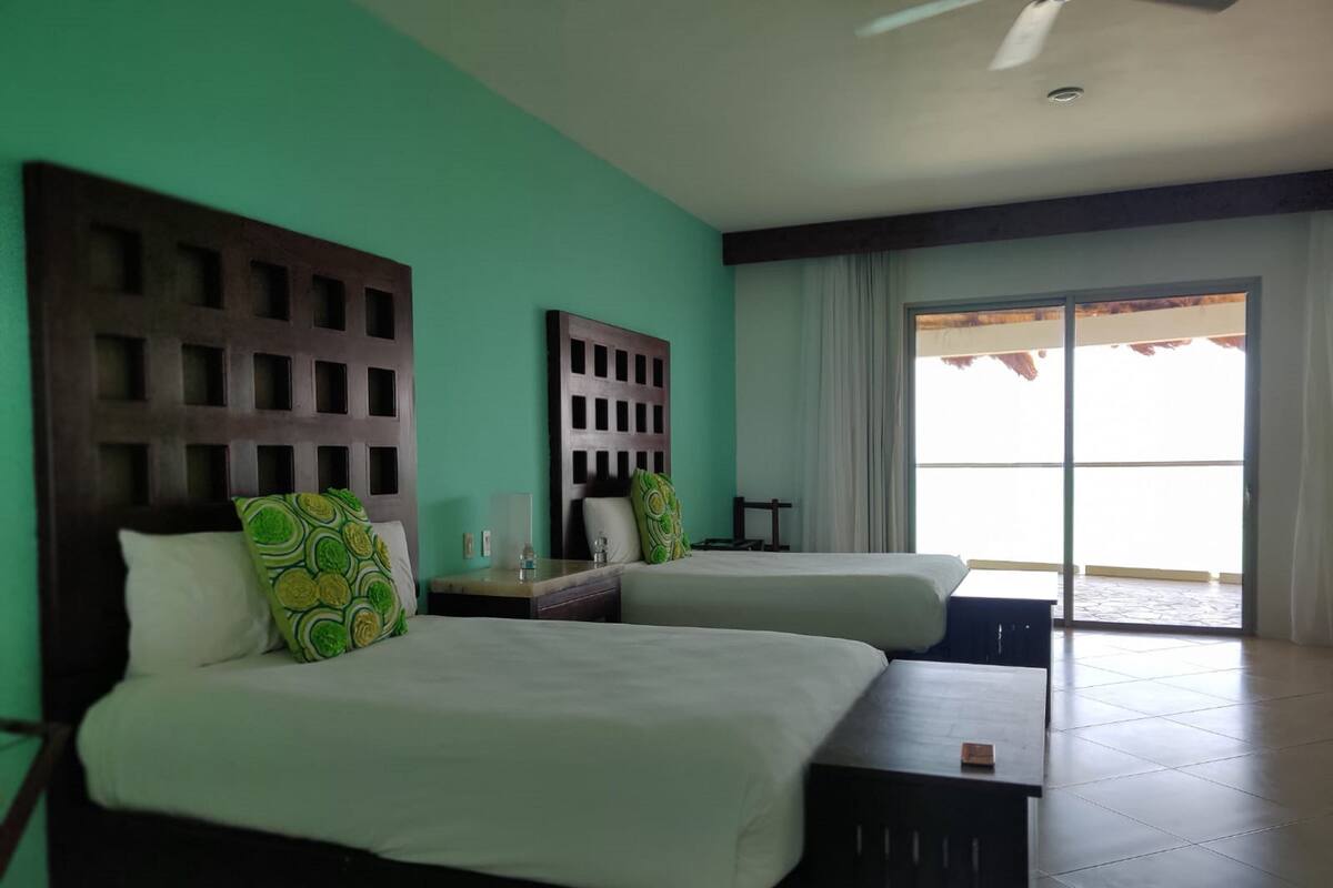 Deluxe Suite, 2 Queen Beds, Accessible, Sea Facing | 1 bedroom, premium bedding, minibar, in-room safe