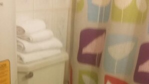 Standard Apartment, 1 Bedroom | Bathroom | Combined shower/bathtub, deep-soaking bathtub, towels - Apart Hotel Ahumada Santiago De Chile (Santiago)
