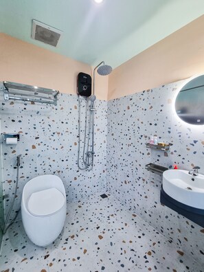 Shower, hair dryer, towels, soap