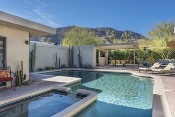 Your Private Backyard Oasis – Relax and recharge in this spacious, secluded backyard with gorgeous mountain views and a large pool as its central feature.