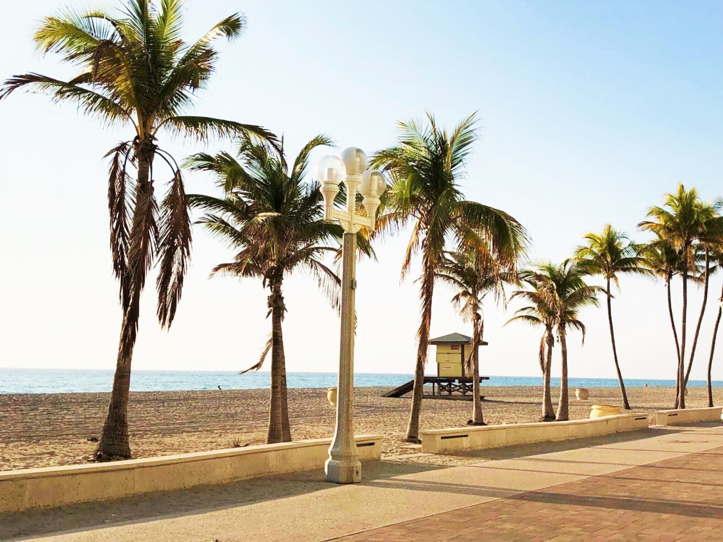 On the beach, sun loungers, beach umbrellas, beach towels