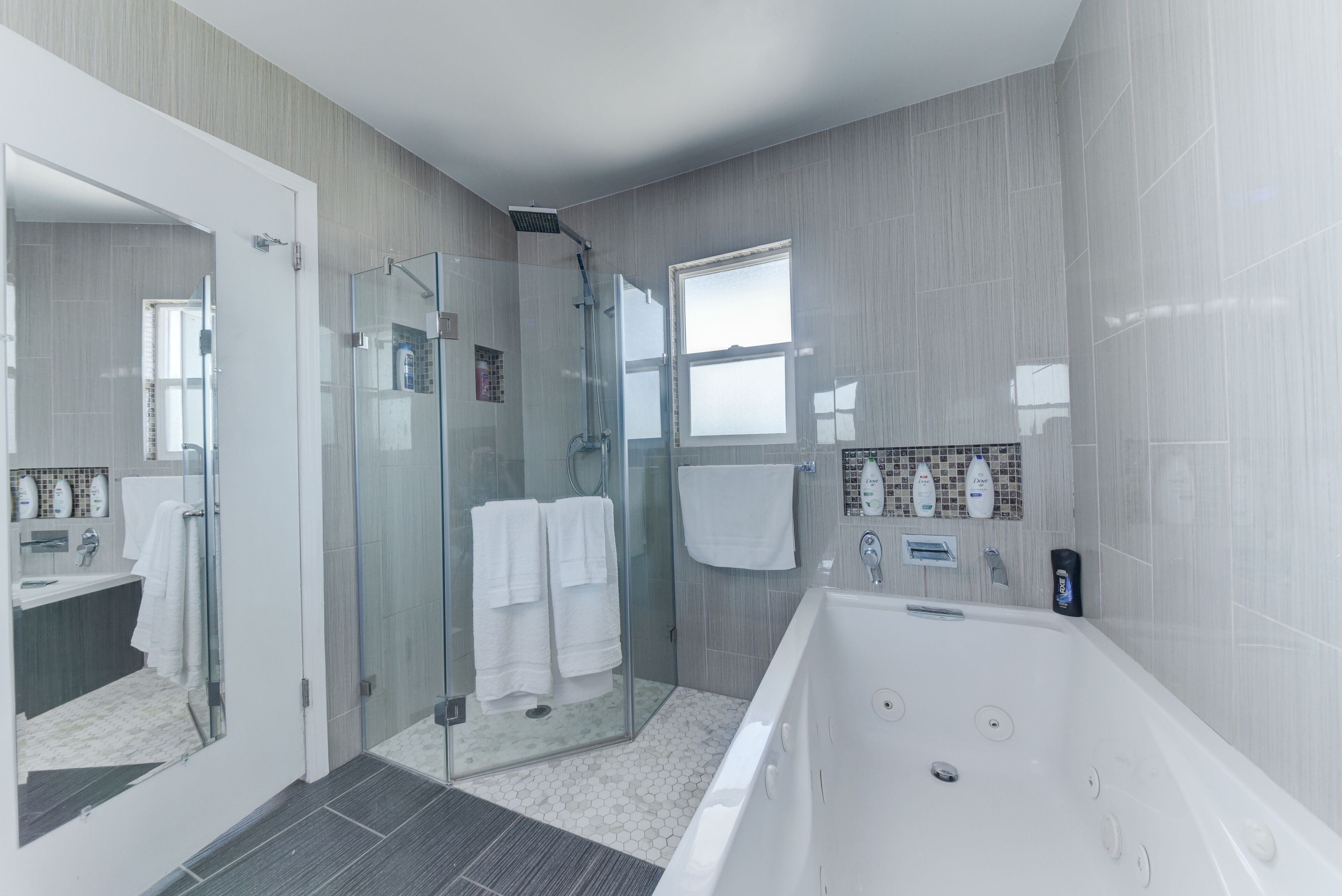 Bathtub, jetted bath, hair dryer, towels