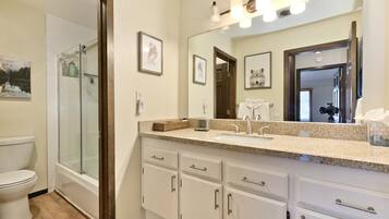 Hair dryer, towels, soap, toilet paper