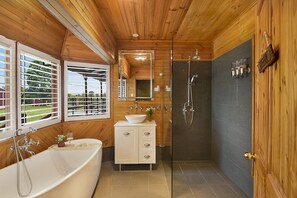 Bathtub, eco-friendly toiletries, hair dryer, towels
