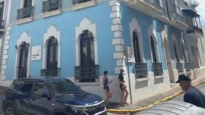 A multi-story building with ornate balconies and a blue facade. - Luquillo, 18th Floor With Ocean Front  (Luquillo)
