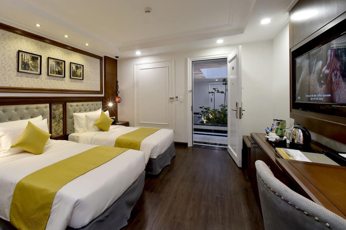 Kamar Twin Deluks | Minibar, meja kerja, tirai kedap cahaya, dan Wi-Fi gratis