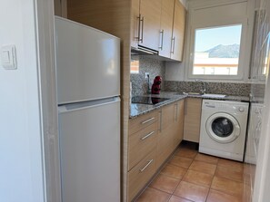 Fridge, microwave, coffee/tea maker, toaster