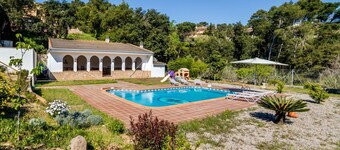 Villa 20 pax with large private pool, garden and barbecue. Outdoor kitchen and dining room. 10 bedrooms. Free WIFI. Vivalidays Villa Genis. 