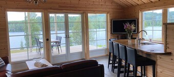 Luxurious Stuga on a tranquil lake with private lakeside access, sauna and dock