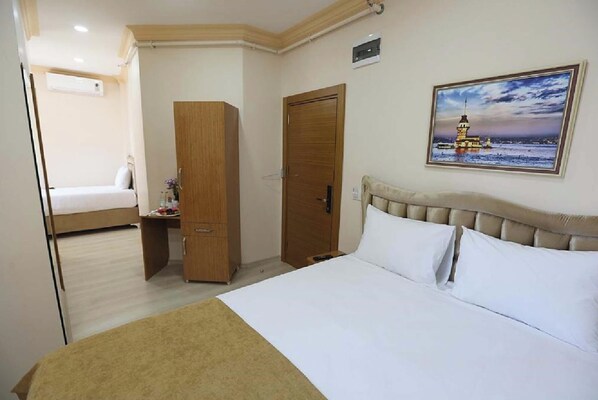 家庭房 | 迷你吧、客房内保险箱、遮光窗帘、隔音