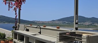 Spectacular view of the river, the sea and Spain. Magnificent layer of sun !!