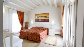 Habitació superior | Llençols de cotó egipci, roba de llit d'alta qualitat i cobrellits